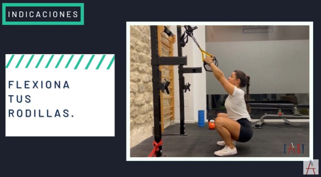 Entrenamiento para hernias lumbares, sentadilla con trx